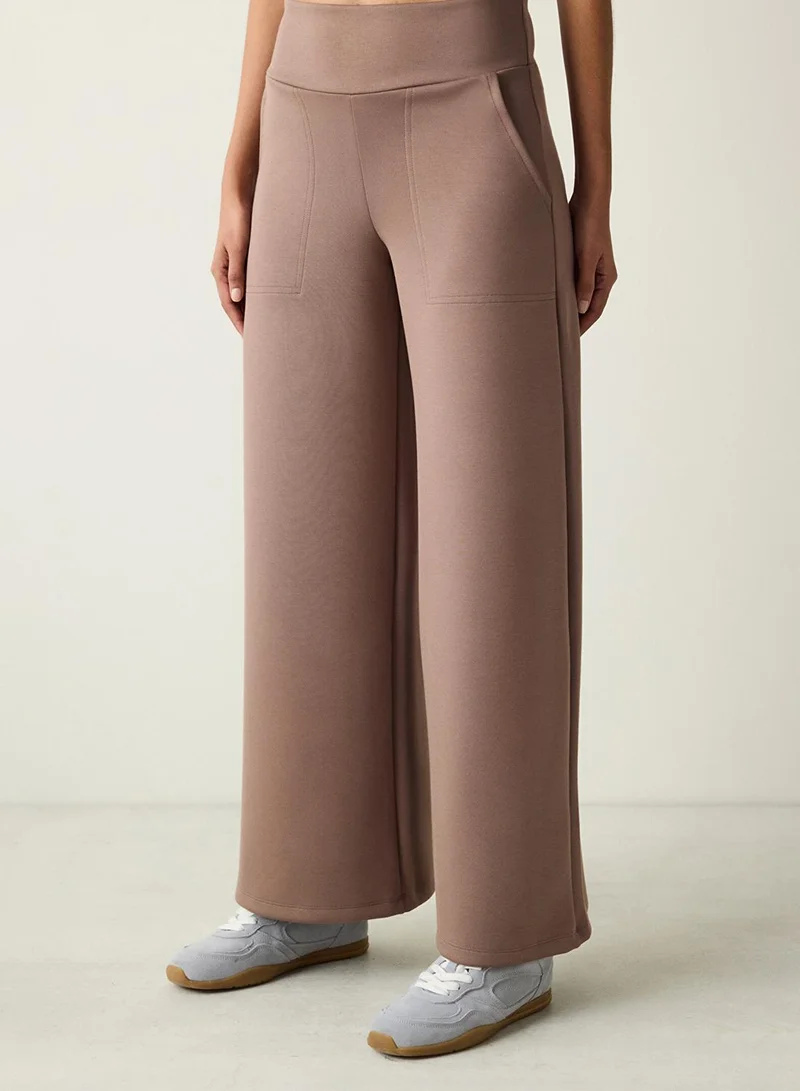 بنتي بنطلون واسع الساق بخصر مطاطي وجيوب